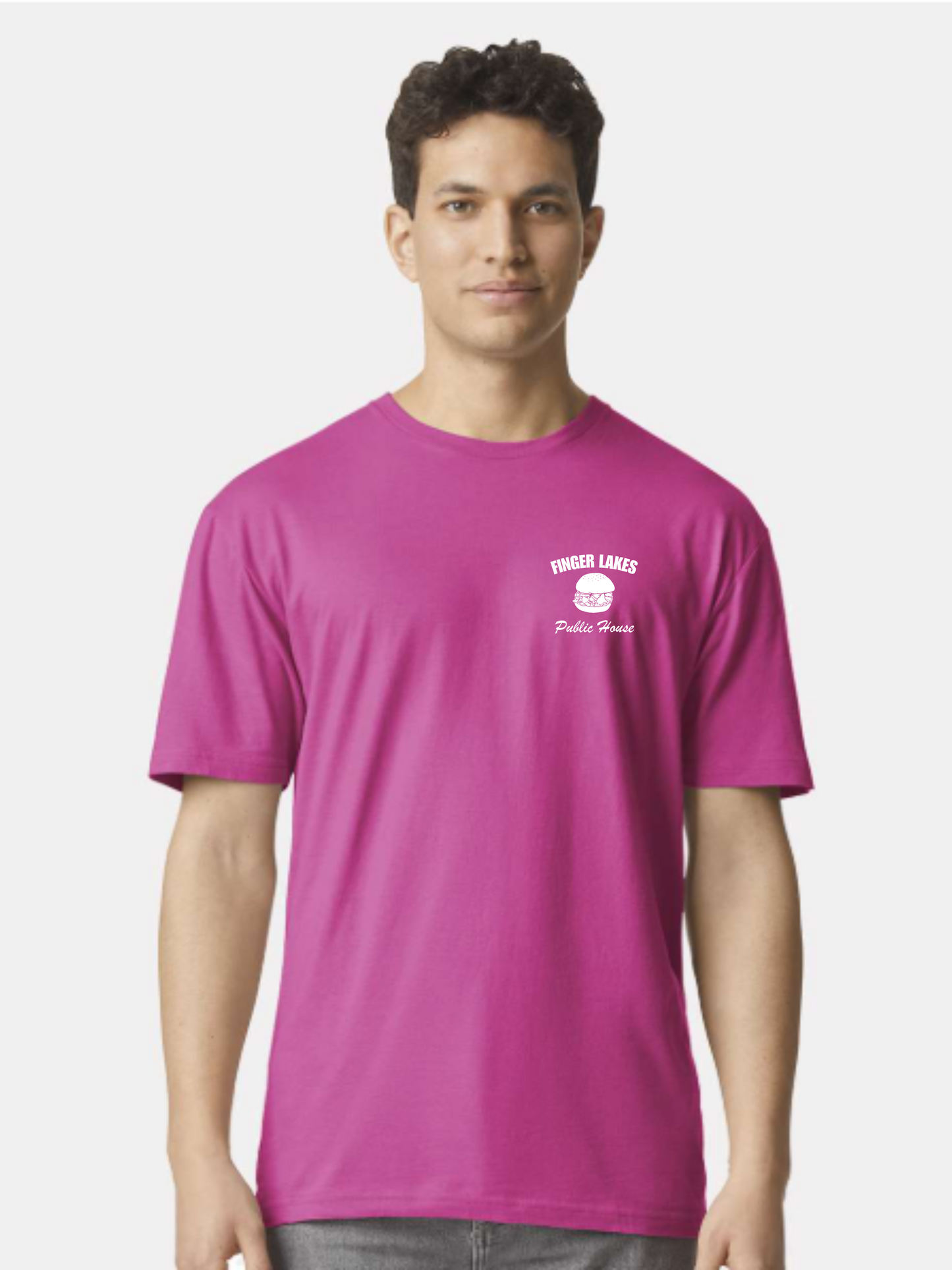 Person wearing a pink t-shirt with a logo on a white background